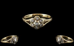 A 9ct Gold Diamond Chip Ring in a Flower