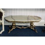Onyx Topped Coffee Table of shaped form, raised on a gilt metal base.