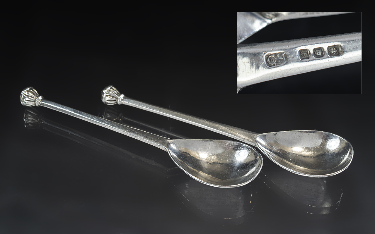 Guild of Handicrafts: A Pair of English Arts and Crafts Silver Honey Spoons each with a hand