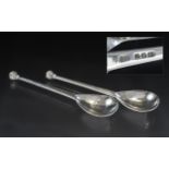 Guild of Handicrafts: A Pair of English Arts and Crafts Silver Honey Spoons each with a hand