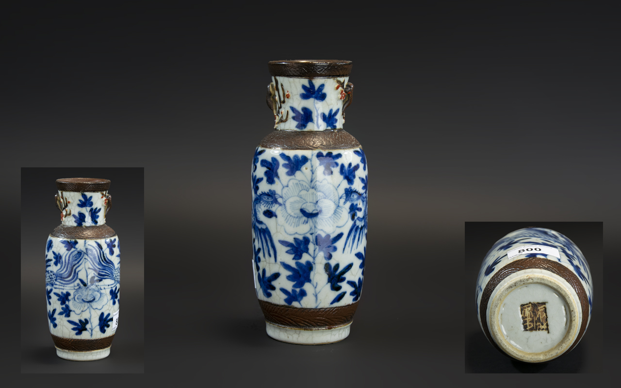 A Small Antique Chinese Blue & White Decorated Crackle ware Vase, with character mark to base.