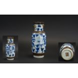 A Small Antique Chinese Blue & White Decorated Crackle ware Vase, with character mark to base.
