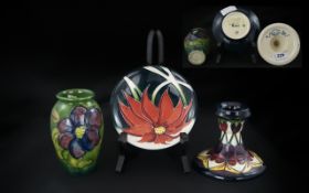 Moorcroft Trio of Small Hand Painted Tubelined Modern Pieces comprising 1/ Squat Candlestick,