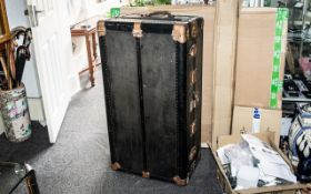 A Steamer Trunk, fitted interior, metal strapwork mounts, of typical form.