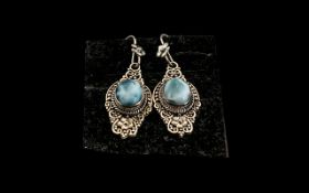 Larimar Long Drop Earrings, two solitaire, oval cabochon cuts of larimar, the beautiful, rare, sea