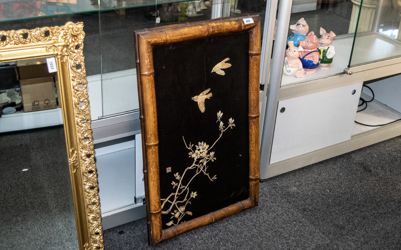 An Antique Japanese Ivory Panel depicting birds in flight,