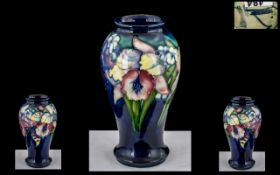 William Moorcroft - Tube lined Signed Baluster Shaped Vase ' Blue Orchid ' Design. c.1930's.