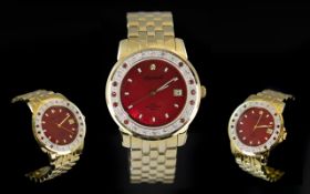 Ingersoll Diamond and Ruby Set Gents Gold on Steel Wrist Watch, features a red dial, gold markers,