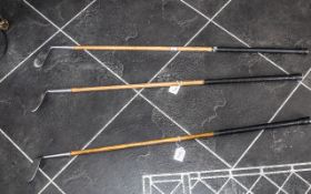 Three Vintage Golf Clubs with hickory shafts and 'Staynorus' rustless alloy heads