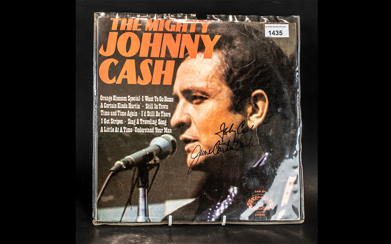 Johnny Cash and June Carter Cash Autographs on LP cover (Record Inside)