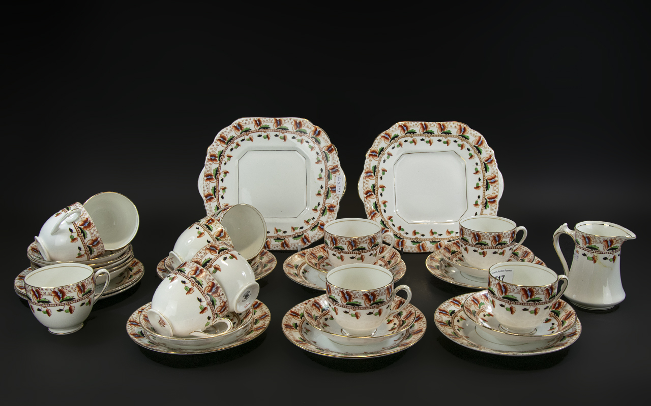 Edwardian 'Salisbury Porcelain' Part Tea Set comprising 11 cups and saucers, 8 small tea plates,