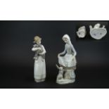 Lladro Hand Painted Pair of Porcelain Figures comprising 1/ 'Rabbit's Food', model no.