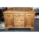 Large Pine Dresser and Rack of Typical Form, the rack with three fixed shelves,