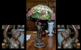 Tiffany Style Leaded Glass Shade Electric Lamp, Supported by a Bronzed Lady Figure.