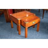 Contemporary Nest of Two Yew Wood Tables with brass corner mounts and square legs of robust