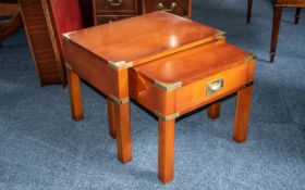 Contemporary Nest of Two Yew Wood Tables with brass corner mounts and square legs of robust