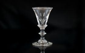 Small 18th Century Trumpet Shaped Bowl Liqueur Glass with a knobbed stem; 4 inches (10cms) high,