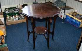 Early 20th Century Mahogany Table, Arts and Crafts style, shaped top, shaped legs.