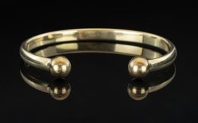 9ct Gold - Solid and Heavy Torque Bangle. Fully Hallmarked for 9.375. Inner Diameter 6.90 cms. 32.