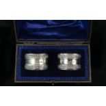 Edwardian Period Fine Quality Boxed Pair of Sterling Silver Napkin Holders with Cast Silver Border