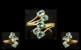 Paraiba Apatite 'Journey' Ring, five oval cut, sparkling, sea blue paraiba apatites trail down the