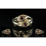 9ct Gold Double Snake Head Ring, Set with Blue Sapphire Eyes. Fully Hallmarked for 9ct. Ring Size S.