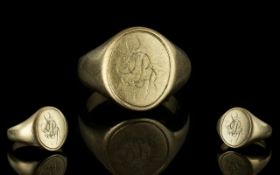 9ct Gold Signet Ring of Plain Form. Ring Size J. Full Hallmark for 9.375. Weight 7.4 grams.