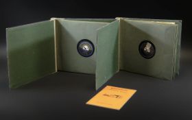 Two Albums of 78s of Linguaphone French Songs. Housed in two hardback albums.