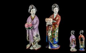 Pair of Japanese Figures Circa 1900, used as candlesticks, a/f.