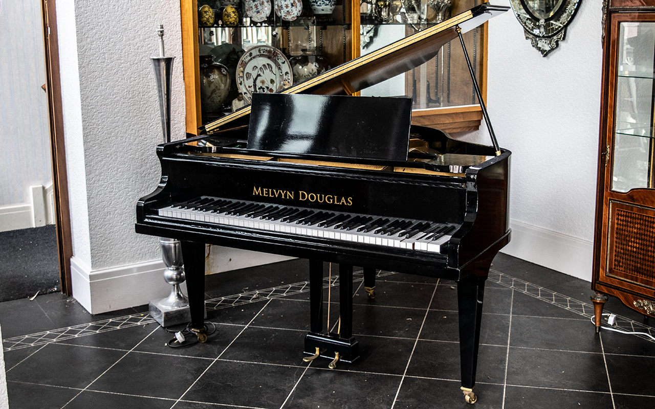 Melvyn Douglas Black Lacquered Baby Grand Piano with an overstrung iron frame - Metzler,