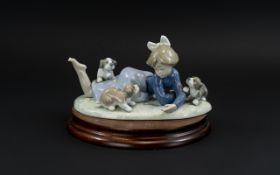 Lladro Hand Painted Porcelain Figure 'Little Girl Playing With Puppies', model no.