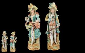 A German 19th Century Pair of Large and Impressive Hand Painted Bisque Figures of Well Dressed 18th