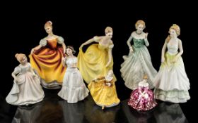 A Collection of Porcelain Lady Figures (8) in total.