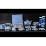 Collection of Seventeen Pieces of Wedgwood Jasper Ware comprising a tea pot, Jubilee plates, vases,