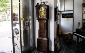 A Late Georgian Mahogany Cased Grandfather Clock, with an arched brass 8-day movement dial,