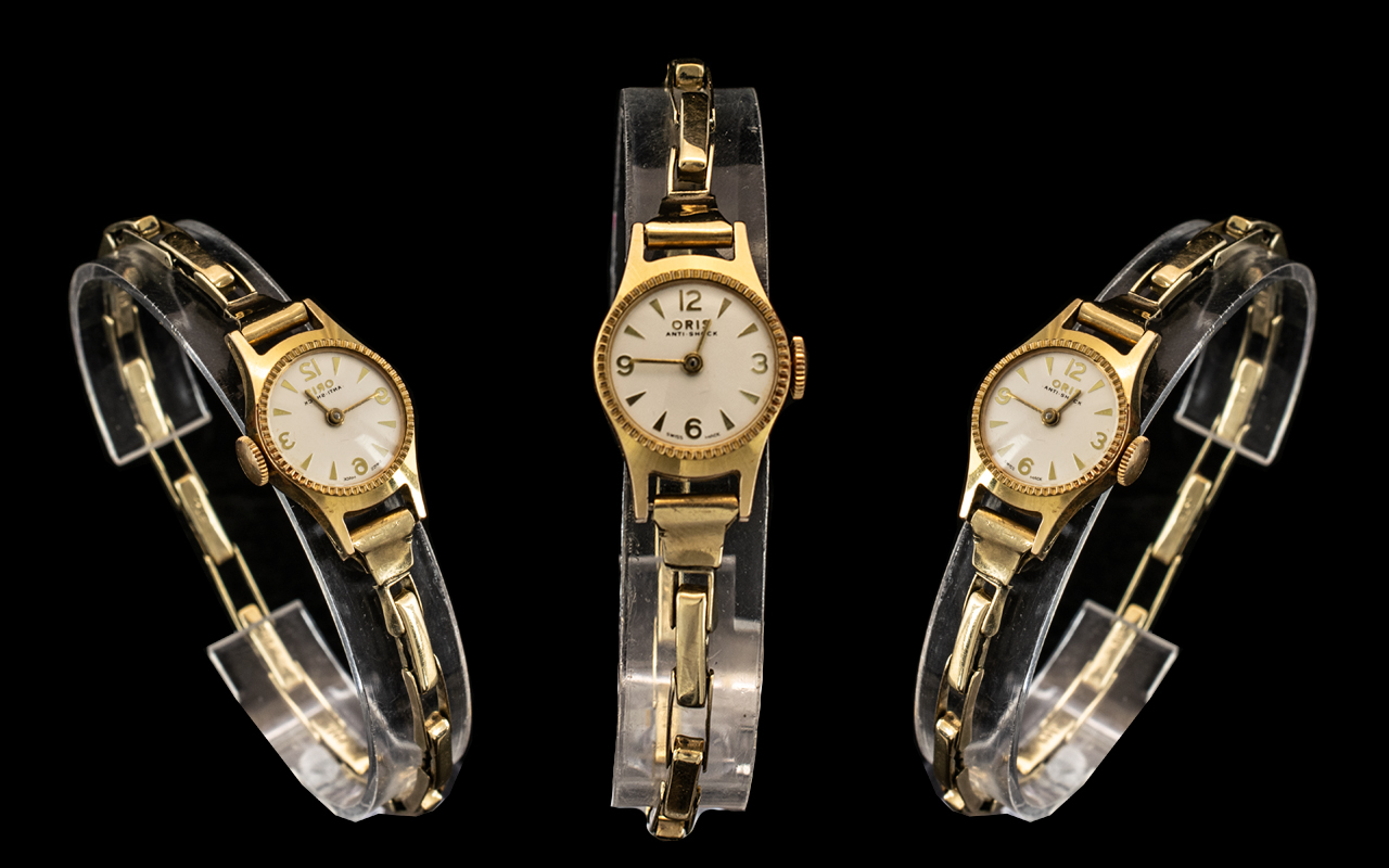 Ladies Oris 9ct Gold Mechanical Wind Wrist Watch with Attached 9ct Gold Expanding Bracelet. Both