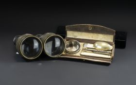 Boar War Campaign Cutlery in leather case, together with a pair of military field glasses.