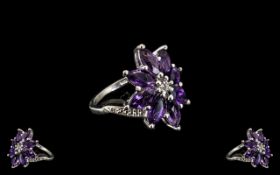 Deep Purple Amethyst Cluster Ring, eight marquise cut amethysts, totalling 4cts, form an