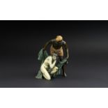 Austrian Style Cold Painted Bronze Group of a Nubian with a Slave Girl, unsigned, 7 inches (17.