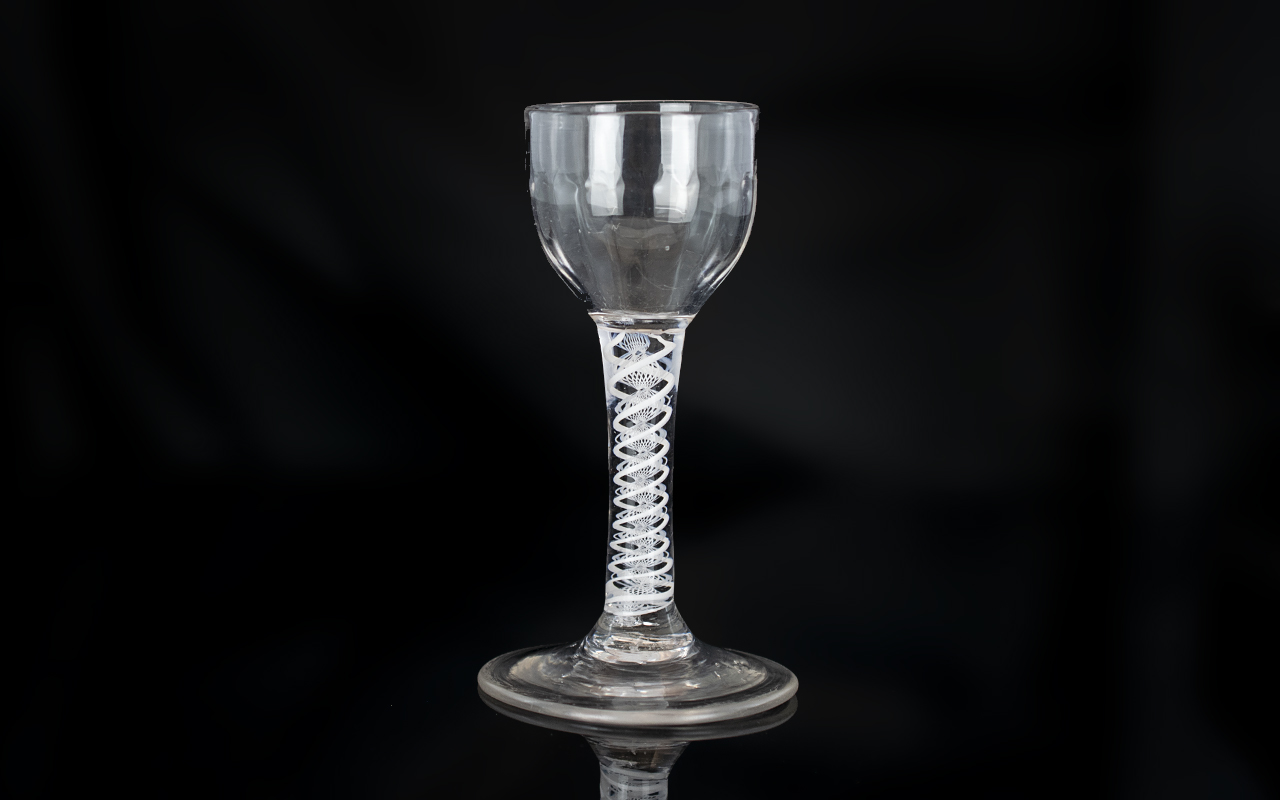 18th Century English Double Helix Cotton Thread Stem Cordial Glass with a fluted bell bowl,
