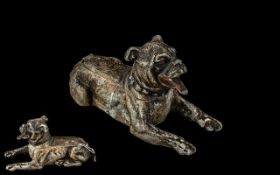 Antique Cold Painted White Metal Figure of a Reclining Dog, on a hinged lid, which opens to reveal