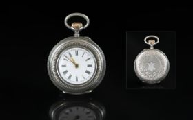 Small Swiss Silver Ladies Pocket Watch, engraved floral pattern with vacant cartouche,