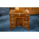 Fine Quality Edwardian Small Queen Anne Style Kneehole Desk with a bank of three drawers down each