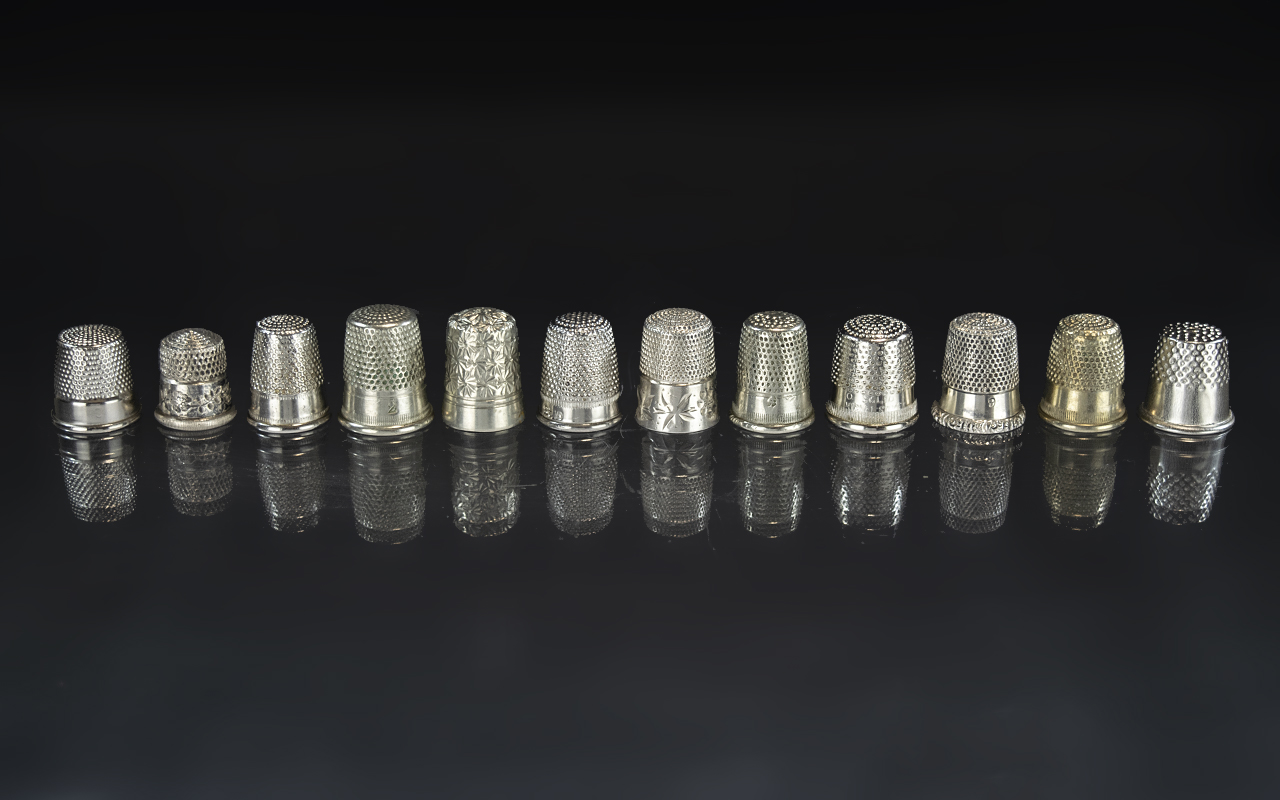Good Collection of Antique and Vintage White Metal Thimbles, twelve in total,