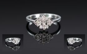 18ct White Gold Attractive Diamond Set Dress Ring, in a contemporary setting, the diamonds,