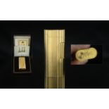 Dunhill - Expensive Gents 20 Microns Gold Plated Engine Turned Cigarette Lighter.