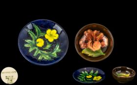 Moorcroft - Pin Dish 3.5'' diameter in blue with yellow pattern, marked to base, together with a