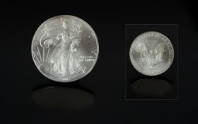 United States of America Liberty Silver One Dollar - Date 2002. 1 oz Fine Silver .999 Purity.