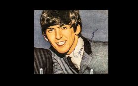 The Beatles Star George Harrison Autograph on magazine picture (1960's) removed from old scrapbook