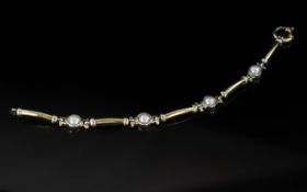 Ladies - Attractive Two-Tone 9ct Gold Contemporary Designed Pearl Set Bracelet with Excellent Clasp.